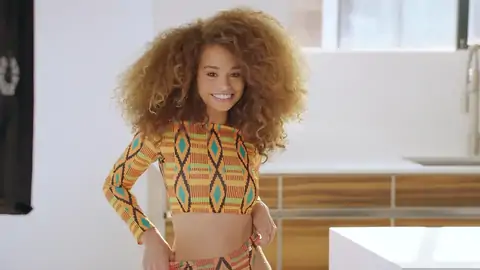 Teenage dark-hued with wavy hair is railing a ginormous salami on the couch